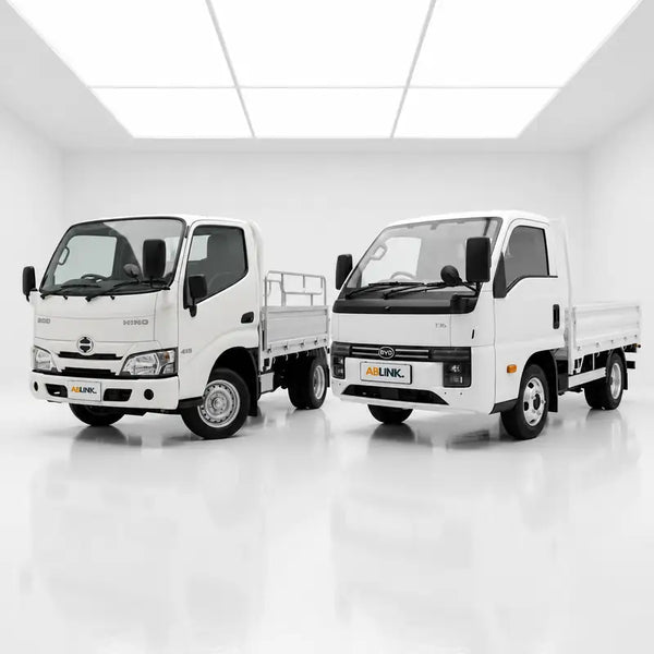 Electric vs diesel lorry Singapore: Hino Dutro diesel 10ft lorry and BYD T35 electric truck with ABLINK plates